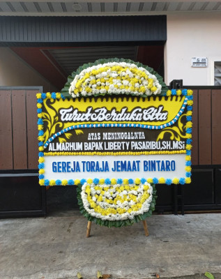 Papan Bunga Duka di Belik